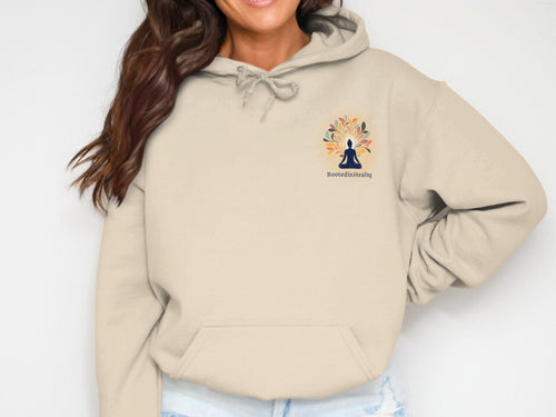 Beige hooded sweatshirt with a colorful tree logo and "RootedInHealing" text.